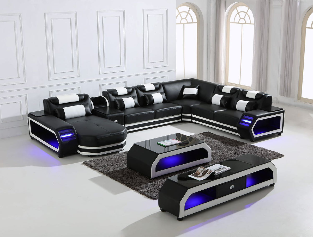 Black and white genuine leather lounge at Quality Rugs and Furniture
