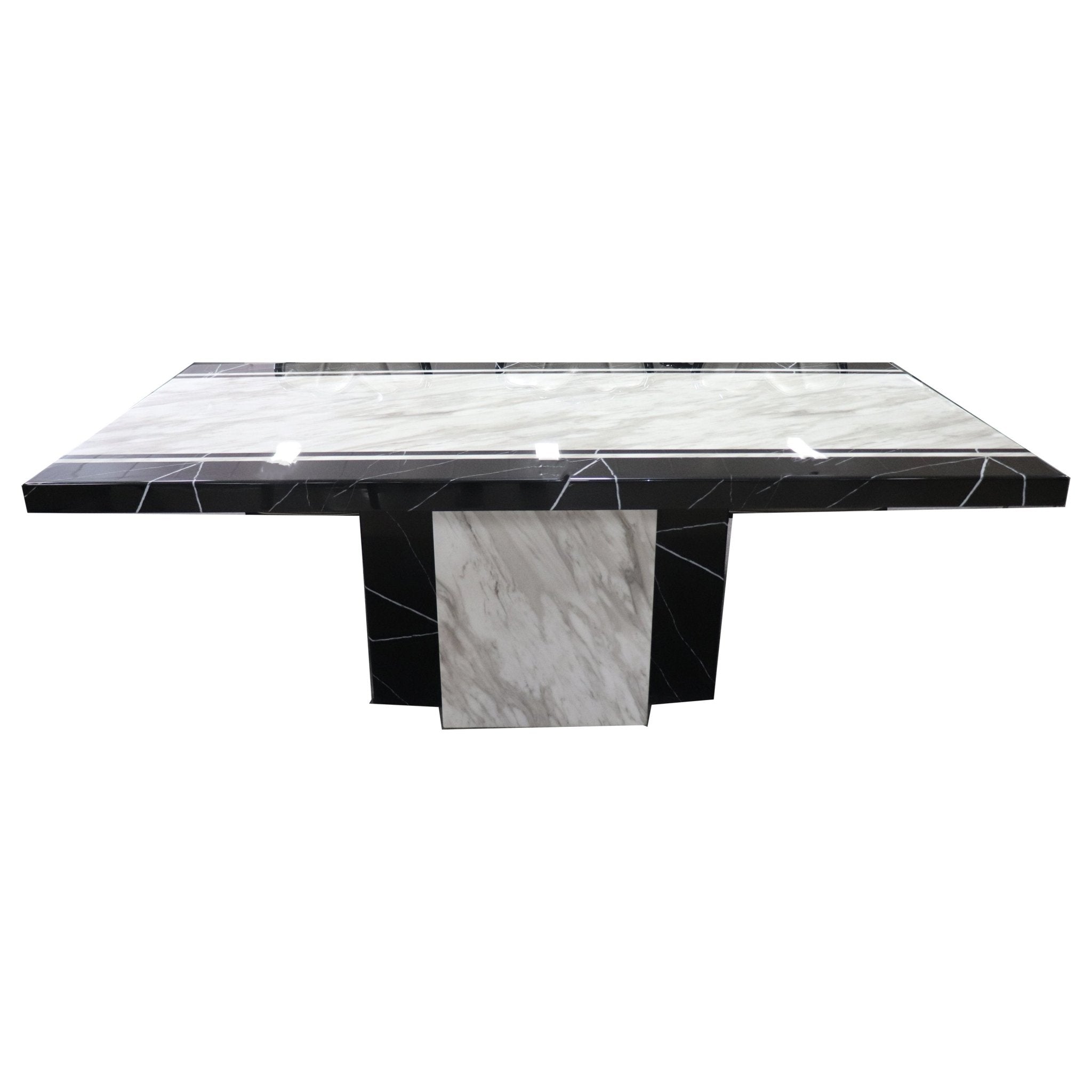 Black and white marble dining table at Quality Rugs and Furniture