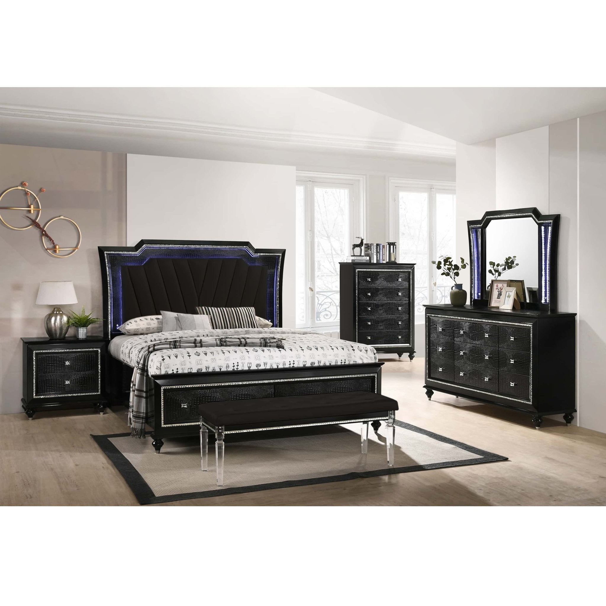 Matching black bedroom furniture suite with bed, dresser and tallboy at Quality Rugs and Furniture